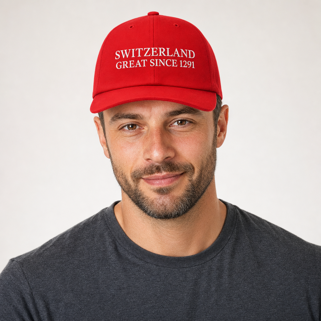 Homme portant la casquette rouge brodée Switzerland Great Since 1291, portrait studio